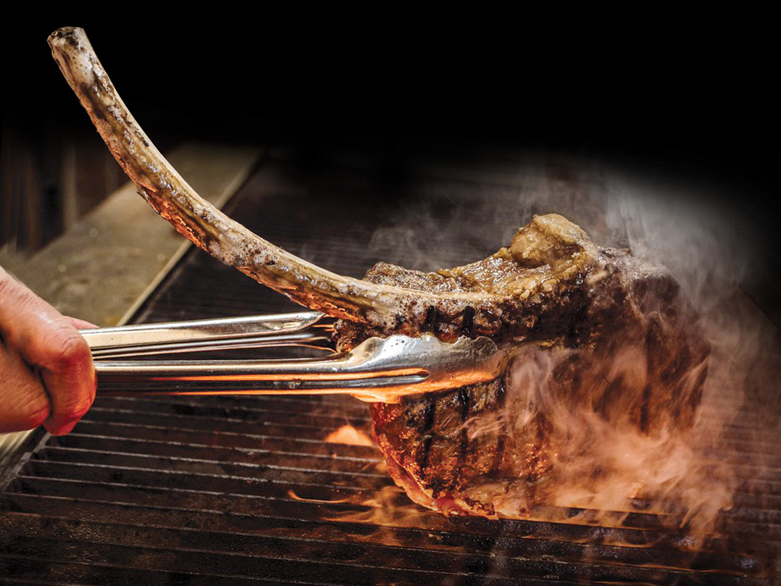 Tomahawk - The Fire Steakhouse.